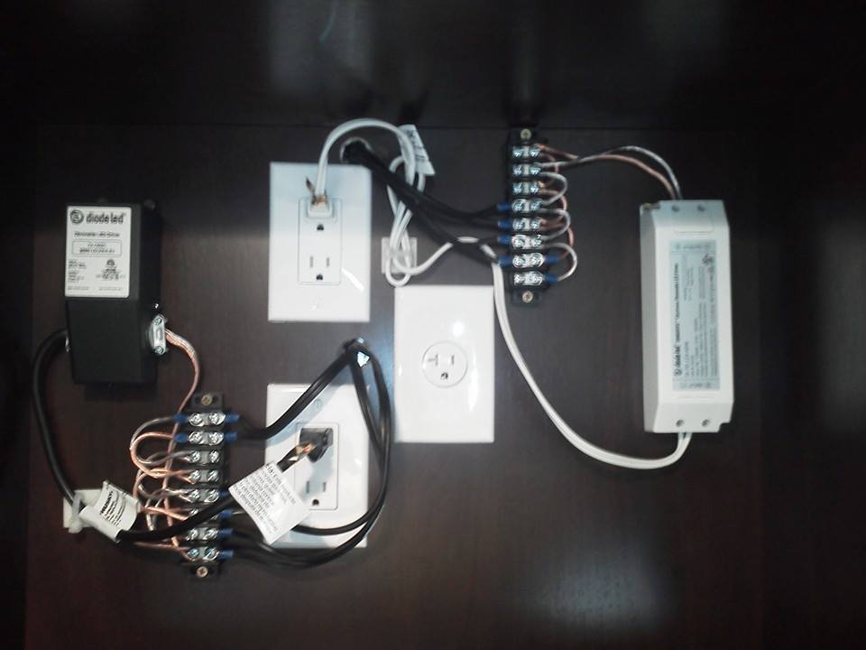 Example work depicting new outlets, including a 220 outlet, and telecommunications wiring